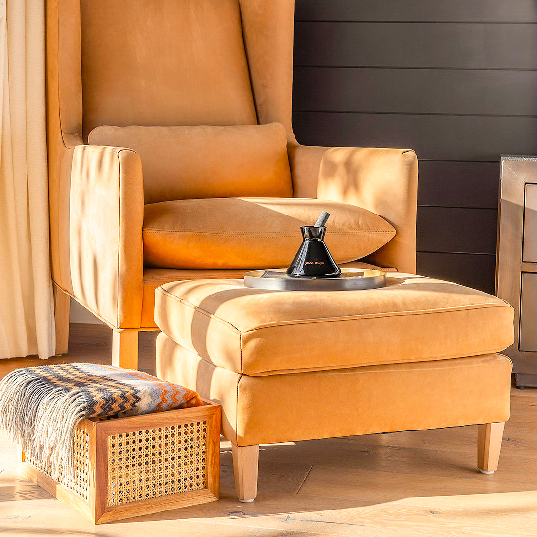 Sienna Maison Gold and Black Dyed Glass Encased in Crystal Glass Lennon Diffuser Set with Thick Reed Styled Display on Chair with Milo Acacia Wood and Cane Rattan Storage Bin