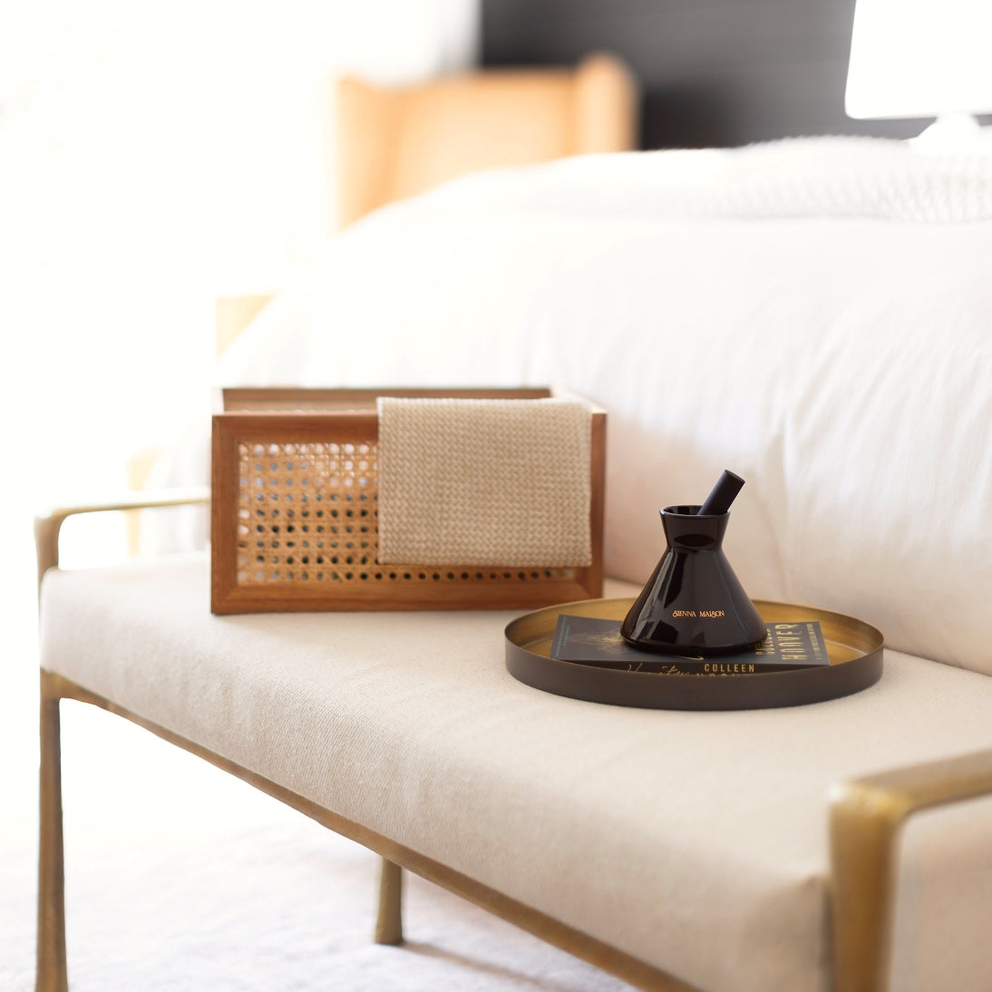 Sienna Maison Gold and Black Dyed Glass Encased in Crystal Glass Lennon Diffuser Set with Thick Reed Styled Display on Bench with Milo Acacia Wood and Cane Rattan Storage Bin and Kiana Kitchen Towel