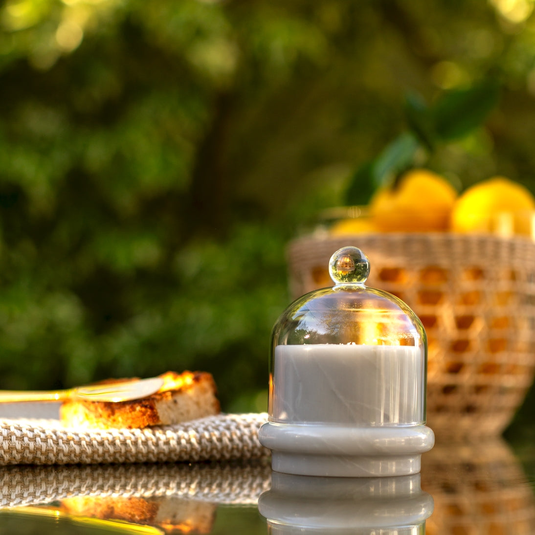 Sienna Maison Hudson White Marble Round Butter Dish with Borosilicate Glass Dome Cloche on Outside Dining Table for Breakfast with Kiana Kitchen Towel and Lemons